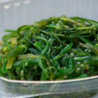 Seaweed Salad · Assorted seaweed with pickled cucumber.