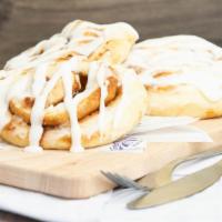 Mini Cinnamon Roll Tin · Conatins six Hand rolled and frosted minature cinnamon rolls.