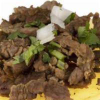 Carne Asada Taco · Corn tortilla, carne asada, cilantro and onion.