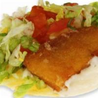 Fish Taco · Corn tortilla, fish, tartar sauce, lettuce.