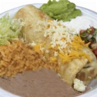 #8 Chimichanga Plate · Deep fried burrito, guacamole, sour cream, lettuce, pico de gallo and cheese.