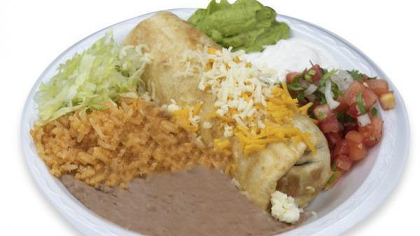 #8 Chimichanga Plate · Deep fried burrito, guacamole, sour cream, lettuce, pico de gallo and cheese.