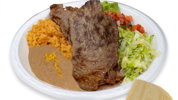 Carne Asada Plate · 2 thin carne asada steaks with guacamole, pico de gallo, lettuce, and tortilla on the side corn or flour.