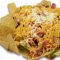 Chips & Salsa · Covered with cheddar cheese, pico de gallo, topped with jack cheese.