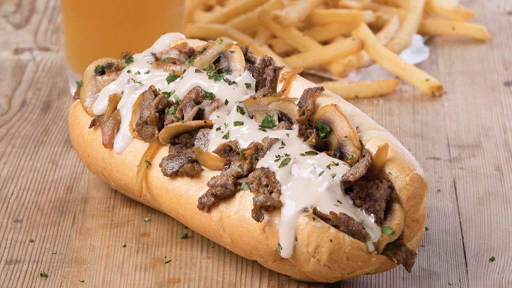 The Republic Philly · Grilled sirloin, caramelized onions and mushrooms, chipotle mayo and Voodoo Ranger Queso inside a traditional hoagie