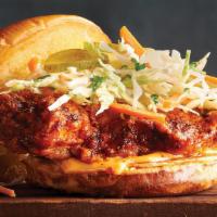 Nashville Hot Chicken Sandwich  · Crispy Nashville-style hot chicken breast topped with dill pickles, creamy coleslaw and spic...