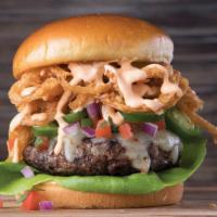 Voodoo Burger · Blackened seasoning, pepper jack cheese, pico de gallo, fresh jalapeños, Tabasco®-fried onio...