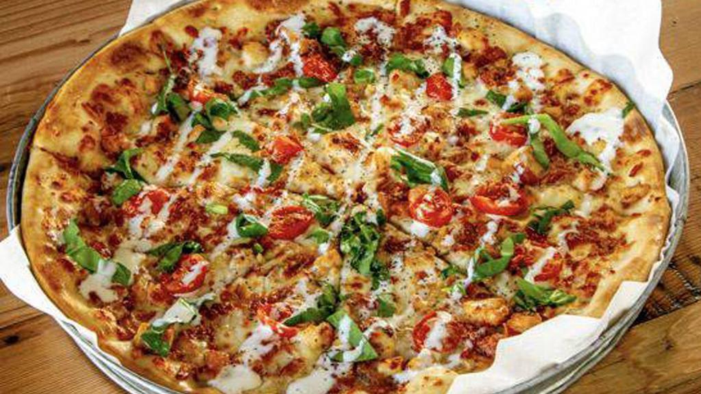 Chicken Bacon Ranch Pizza · Grilled chicken, applewood bacon, spinach, grape tomatoes and mozzarella cheese drizzled with ranch dressing
