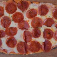 Classic Pepperoni Flatbread · Pepperonis and mozzarella and red sauce on flatbread.