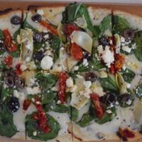 Vegan Mediterranean Flatbread · Baby fresh spinach, sun dried julienne tomatoes, artichoke hearts, kalamata olives, on olive...
