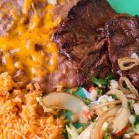 Carne Asada · Select skirt steak charbroiled to your taste with grilled onions, served with Pico de gallo ...
