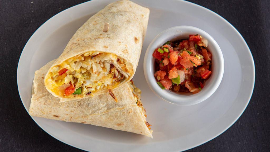 Baja Breakfast Burrito · Farm fresh eggs, scrambled with bacon or sausage, bell peppers, diced onions, hashbrowns and melted cheese wrapped in a warm flour tortilla.