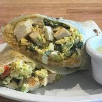Mother Clucker Burrito. · Farm fresh eggs, scrambled with fried chicken fingers, bell peppers, diced onions, hashbrown...
