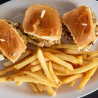 Tiki Sliders. · 3 hawaiian rolls with beef patties, cheese, onions  and fire sauce with cajun fries and dres...