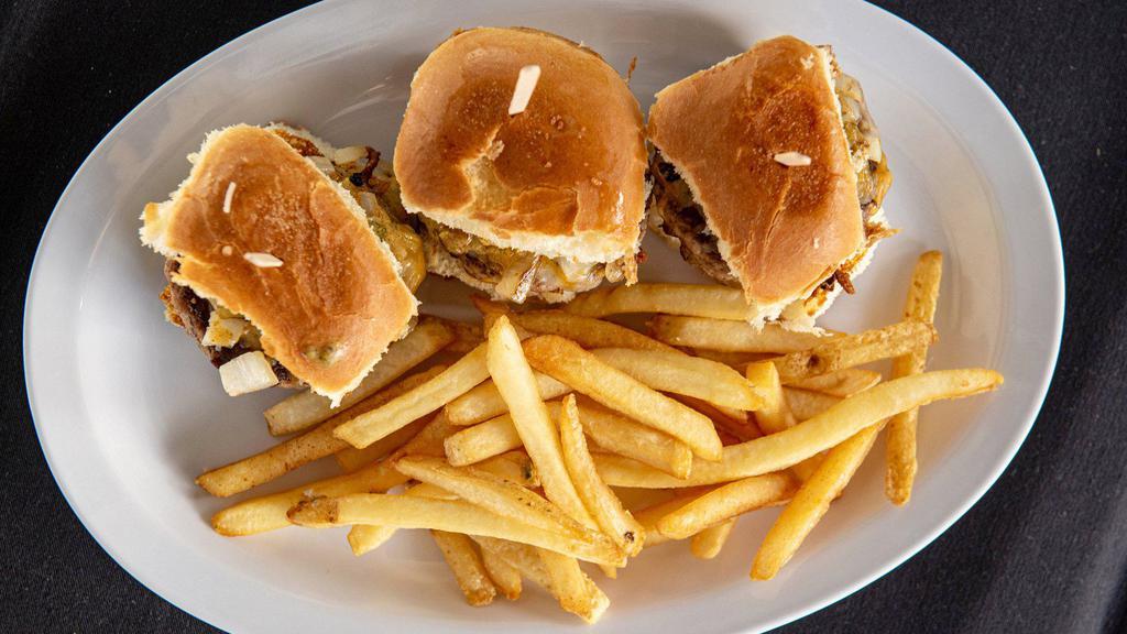 Tiki Sliders. · 3 hawaiian rolls with beef patties, cheese, onions  and fire sauce with cajun fries and dressing on the side.