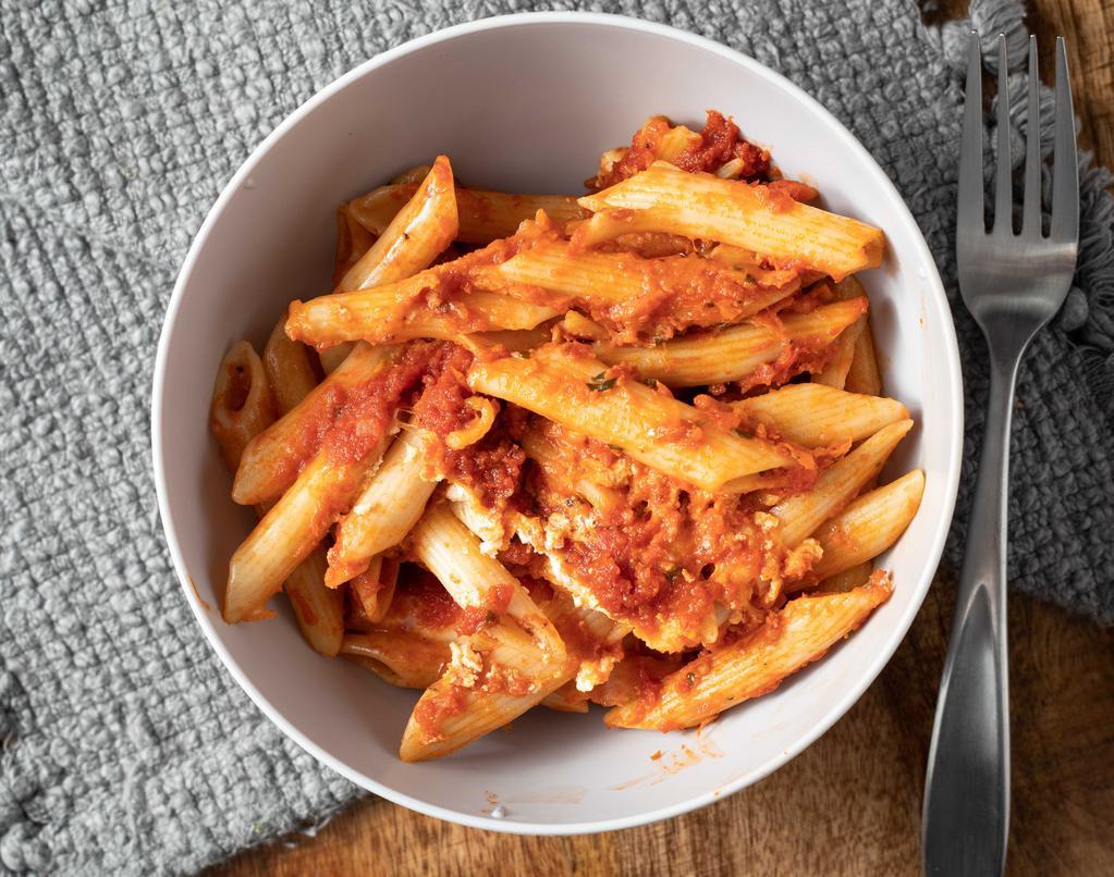 Baked Ziti · Our version of the classic, ricotta, mozzarella and tomato sauce.