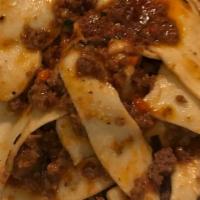Bolognese Ragu · Housemade tagliatelle with our famous ragu with 7 meats.