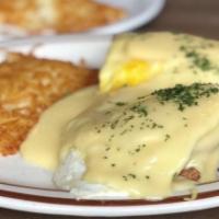 Eggs Benedict · Canadian bacon, two eggs, topped with our home-made hollandaise sauces, served with popular ...