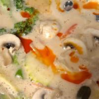 Tom Kha · Coconut milk soup with galanga root, kaffir lime, lemongrass, mushroom, onion, cilantro and ...