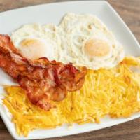 Country Breakfast · Served with two eggs, any style and your choice of  bacon, sausage, bratwurst or ham steak. ...