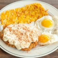 Chicken Fried Steak · Eight ounce breaded steak topped with homemade sausage gravy. Comes with your choice of two ...