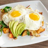 Willamette Valley Skillet · Grilled onions, mushrooms & spinach topped with avocado, tomatoes & Swiss cheese. Mixed with...