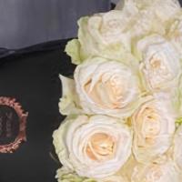 Guilty Pleasure Dozen Roses · Indulge your loved one with something truly special on this day filled with love! The radian...