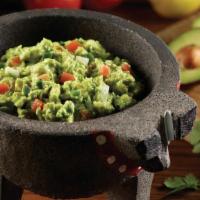 Guacamole · Made in-house with fresh Hass avocados,. Onions, cilantro, tomatoes and jalapenos.  Served w...