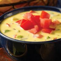 Chile Con Queso · Spicy blend of cheeses.