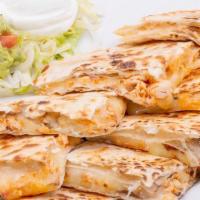 Pulled Chicken Quesadilla · Sautéed pulled chicken, tomatoes, onions, and Monterey Jack on flour tortillas with sour cre...
