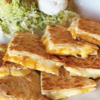 Cheese Quesadilla · Monterrey jack, cheddar on flour tortillas with sour cream and fresh guacamole.