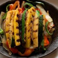 Grilled Vegetable Fajitas For One · Mesquite grilled vegetables including zucchini, yellow squash, portobello mushrooms, sautéed...