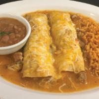 Chicken Enchiladas · Choose between two or three chicken enchiladas with new mexico hatch green chile sauce. Serv...