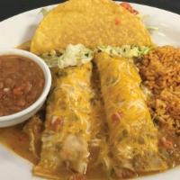Roberto'S Platter · Two shredded chicken enchiladas smothered in New Mexico Hatch green chile sauce and a crispy...