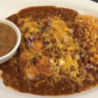Cheese & Onion Enchiladas · Choose between two or three cheese enchiladas with homemade salsa carne. Served with Mexican...