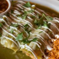 Carnitas Enchiladas · Choose between two or three cheese enchiladas with homemade salsa carne. Served with Mexican...