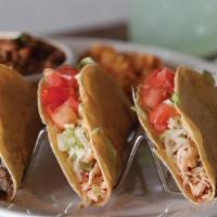 Crispy Taco Plate · Choose between two or three pulled chicken or ground beef tacos with lettuce, tomato, and sh...