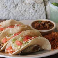 Soft Taco Plate · Choose between two or three pulled chicken, ground beef, mesquite grilled fajita chicken or ...