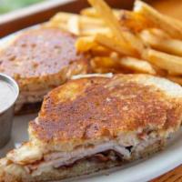 Smoked Turkey, Bacon & Swiss · Smoked turkey, Swiss cheese, and crispy bacon on grilled sourdough bread. Served with honey ...