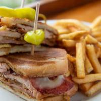The Cuban · Pressed sandwich with Black Forest Ham, turkey, pulled pork, pepperoni, swiss, spicy Alembic...