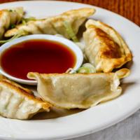 Potstickers (6) · Individually hand made filled with ground pork ginger napa cabbage while folded in a pastry ...