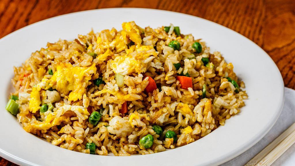 Egg Fried Rice · Most popular entree. Authentic fried rice cooked with eggs, peas and carrots, and green onions
