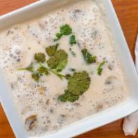 Tom Kha · Delightful soup with coconut milk, lemongrass, lemon leaves, mushrooms, and galanga.