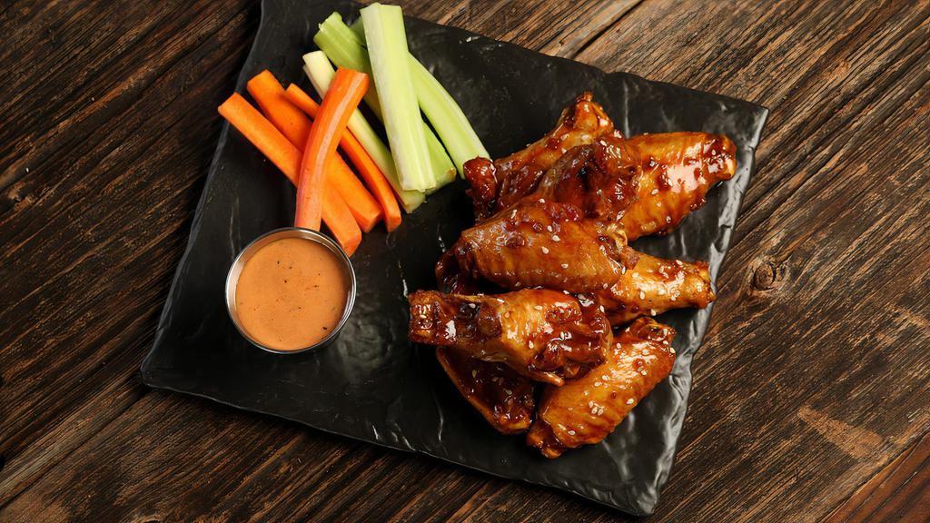 Korean Bbq · 8 Korean BBQ wings, served with carrots & celery and a choice of classic ranch or Sriracha Ranch for dipping (mild heat)