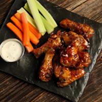 Teriyaki · 8 teriyaki smoked and grilled wings, served with carrots & celery and a choice of classic ra...