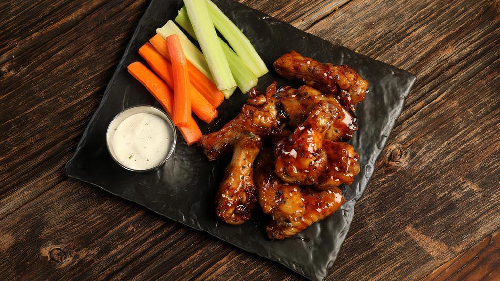 Teriyaki · 8 teriyaki smoked and grilled wings, served with carrots & celery and a choice of classic ranch or Sriracha Ranch for dipping (mild heat)