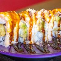Angry Dragon Roll (Special) · Shrimp tempura, cucumber, avocado, cheese topped with spicy king crab with eel sauce, wrappe...