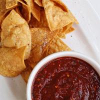Chips & Salsa · House fried corn tortilla chips & our famous red night salsa