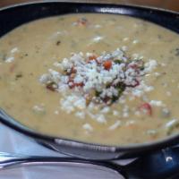 Roasted Poblano & Jalapeño Cream Soup · cotija and pico de gallo, cup or bowl