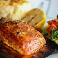 Cedar Salmon · Hand-cut sterling salmon smoked on a cedar plank and served with Yukon gold mashed potatoes,...